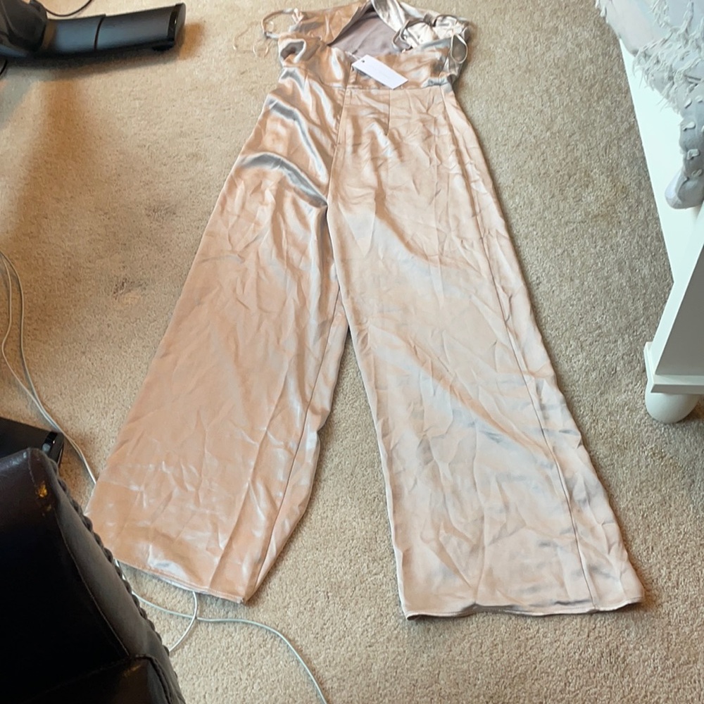 Lush jumpsuit.  To big. Never worn.